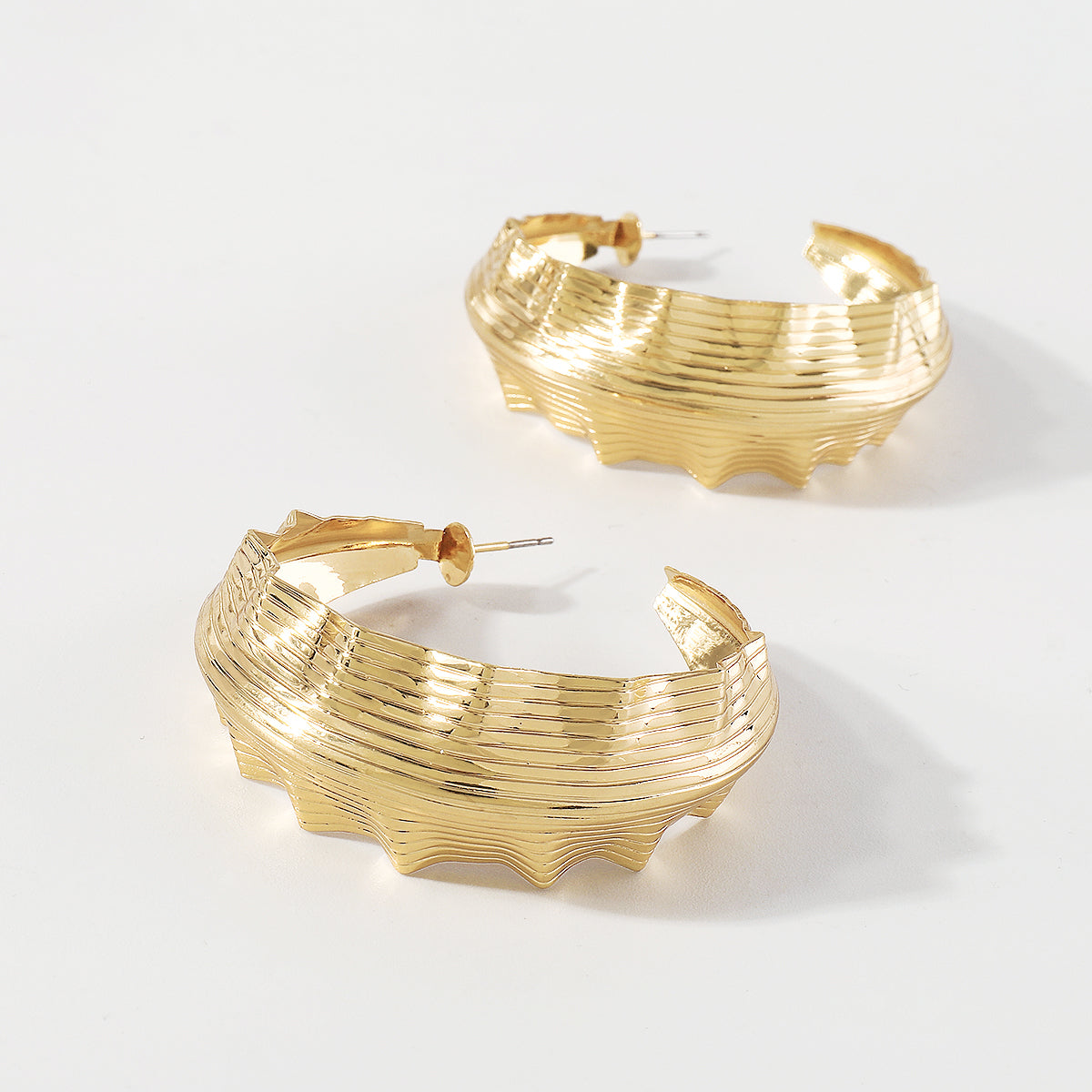 E10954H Large Wavy Round Hoop Earrings