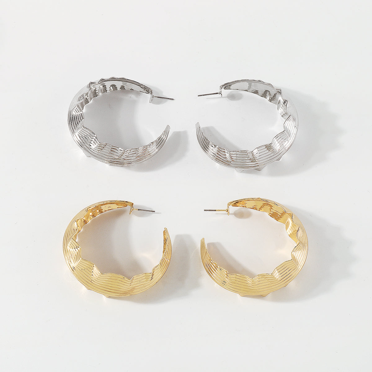 E10954H Large Wavy Round Hoop Earrings