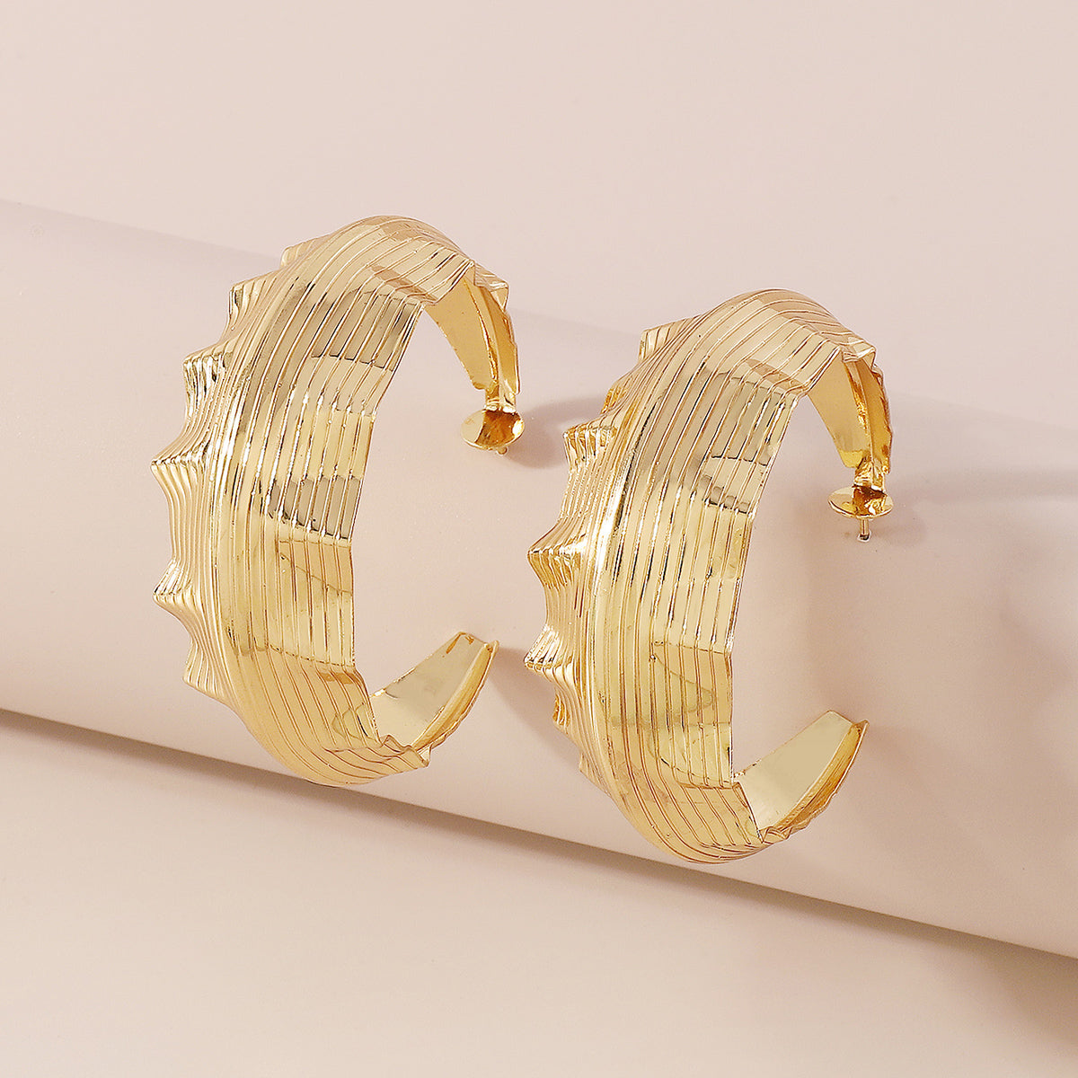 E10954H Large Wavy Round Hoop Earrings