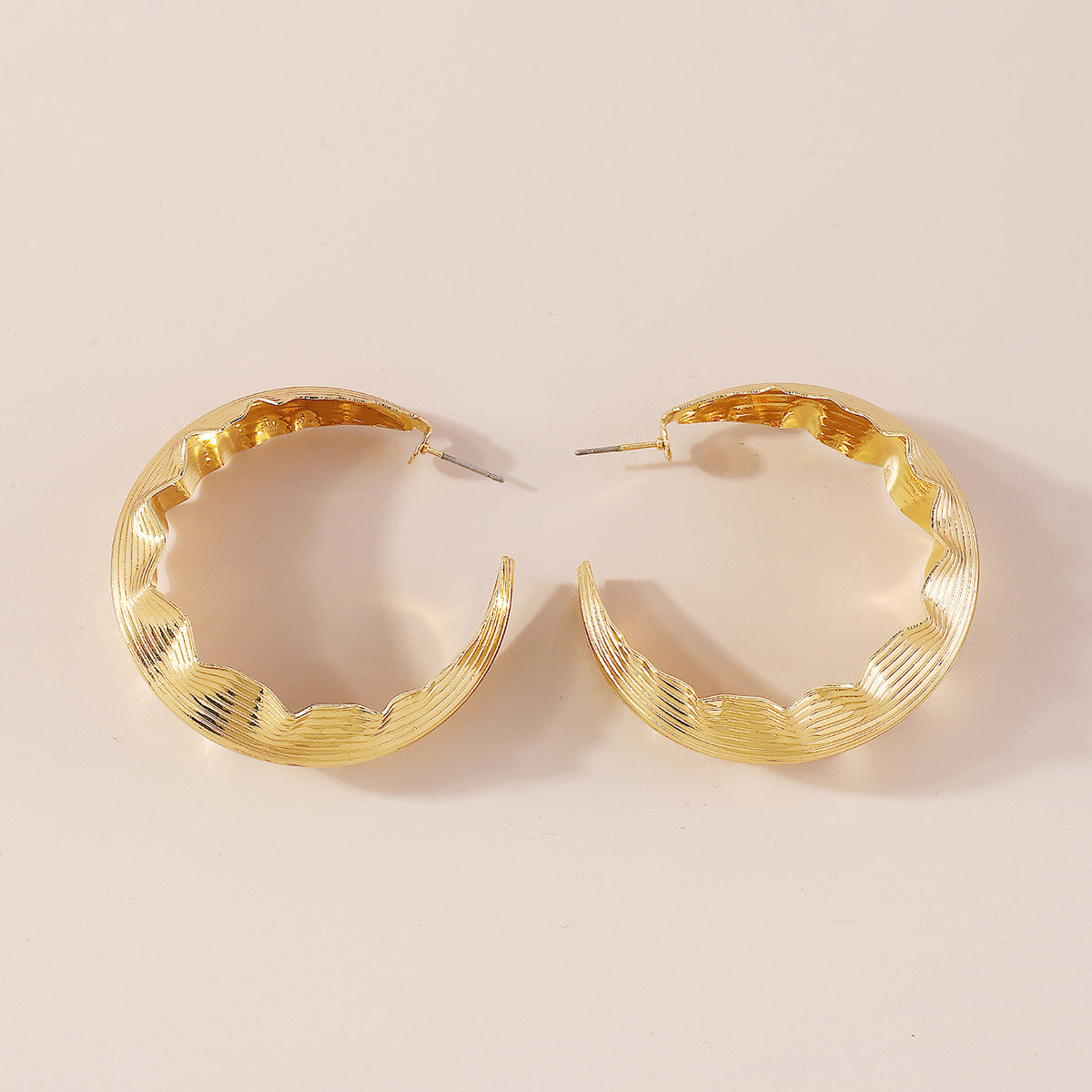 E10954H Large Wavy Round Hoop Earrings