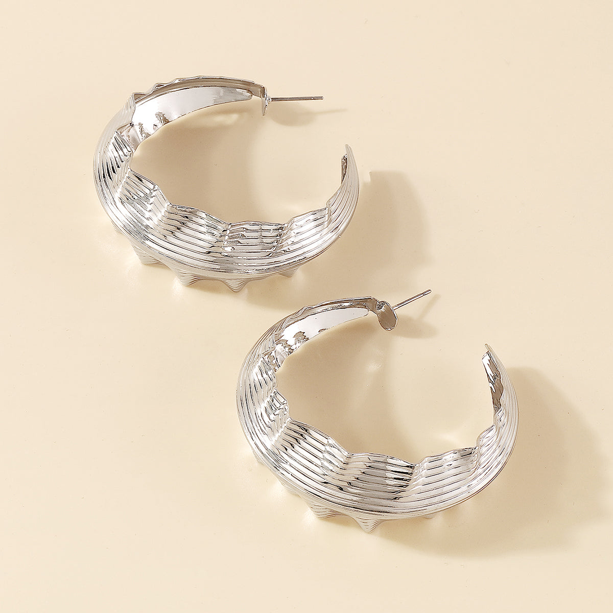 E10954H Large Wavy Round Hoop Earrings