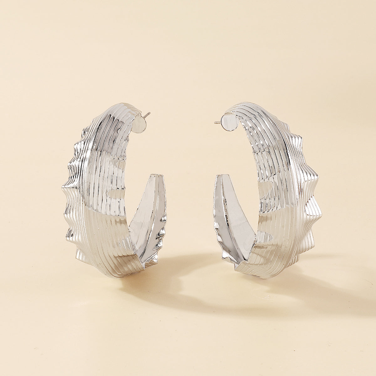 E10954H Large Wavy Round Hoop Earrings